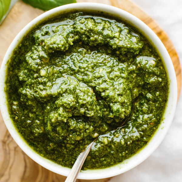 Basil pesto in a white bowl