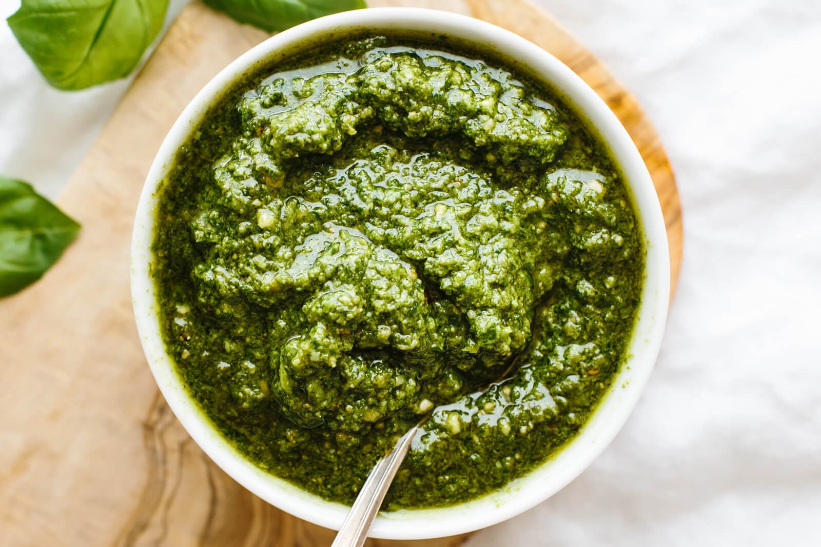 Basil pesto in a white bowl