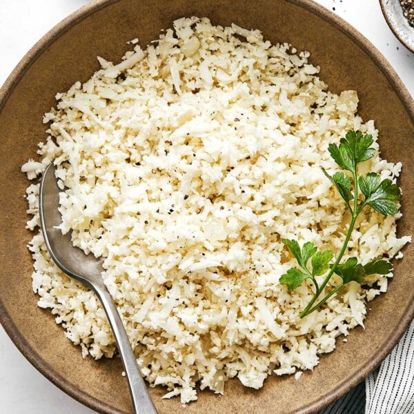 A brown bowl of cauliflower rice.