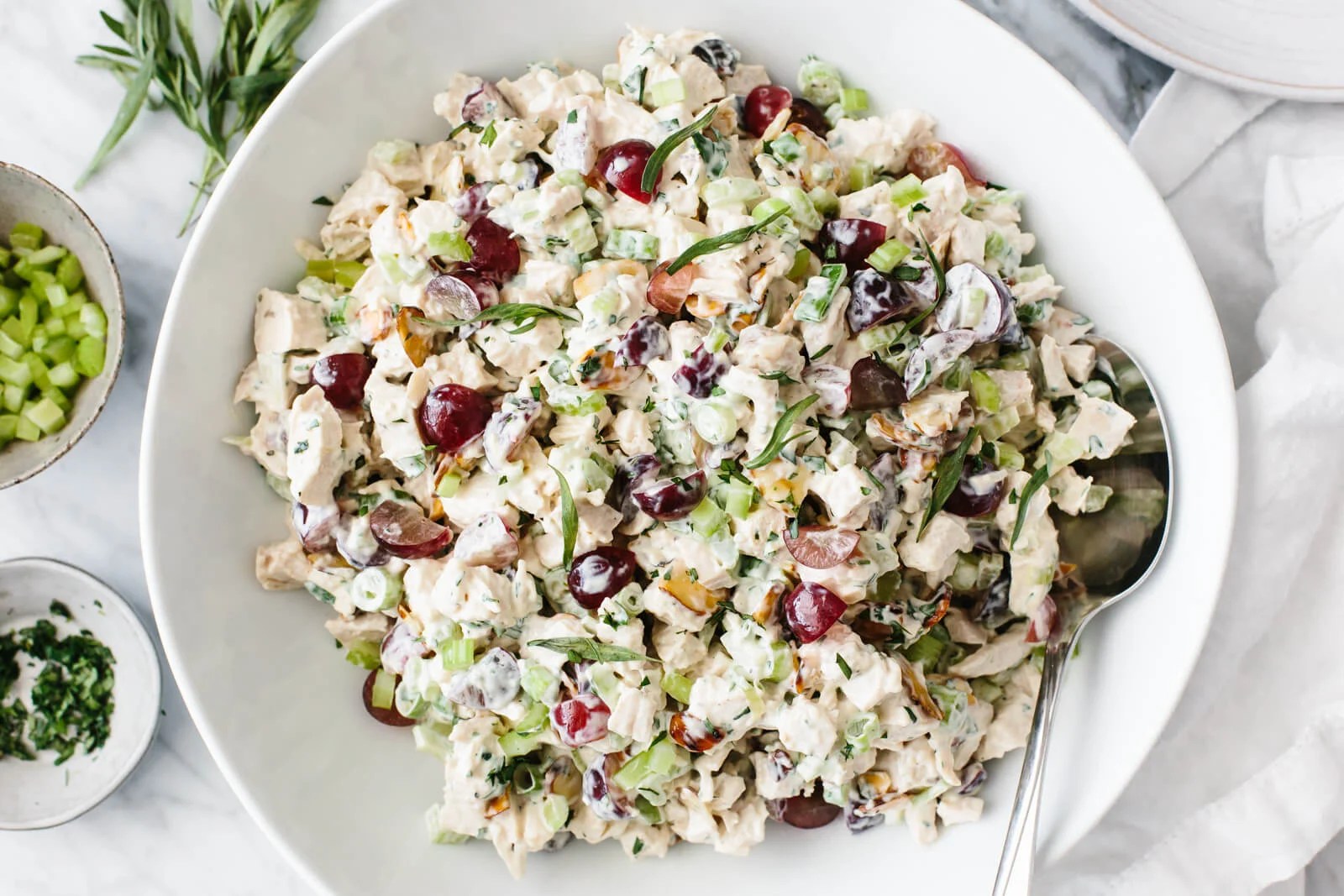 The best chicken salad recipe in a white serving bowl.