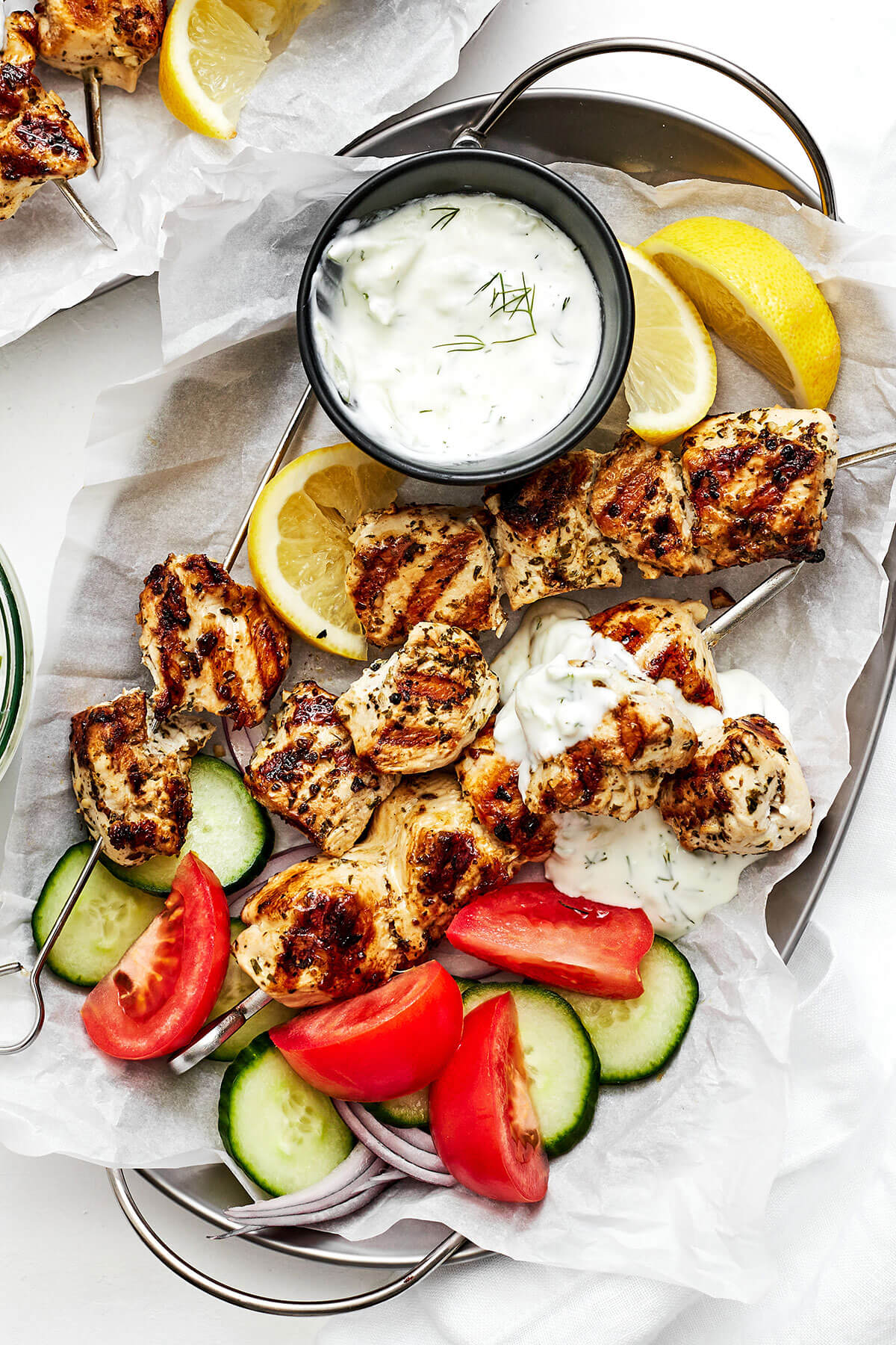 Grilled chicken souvlaki on a plate