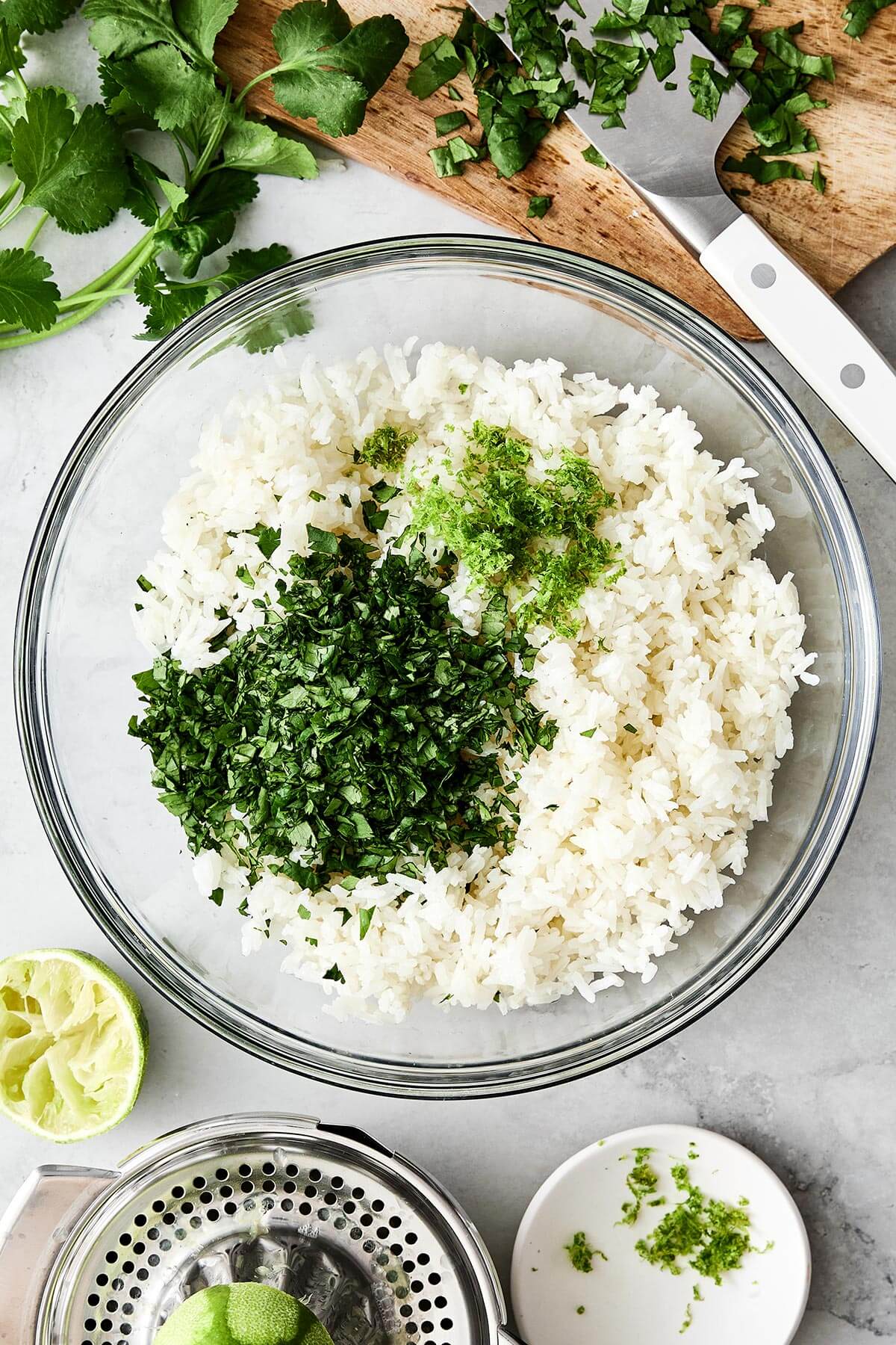 A bowl of cilantro lime rice ingredients.