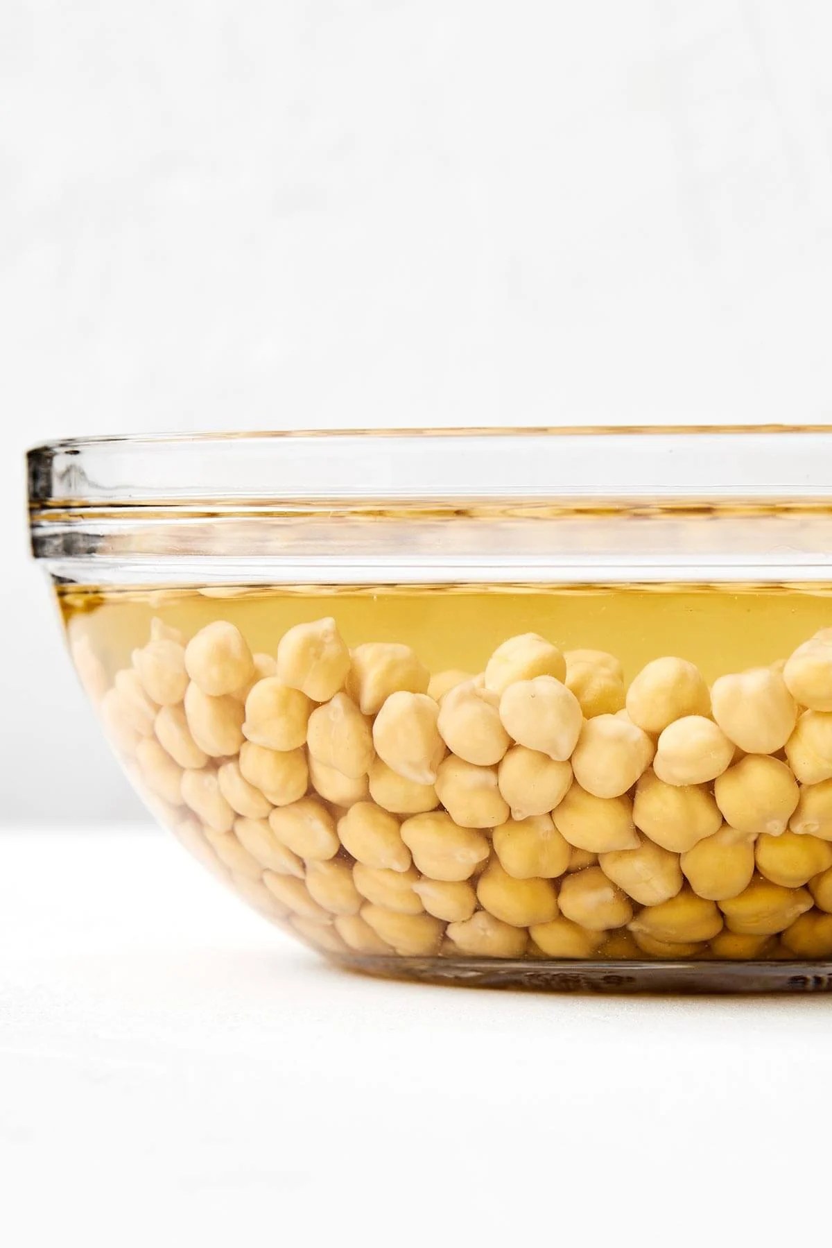 Soaking chickpeas in a bowl.