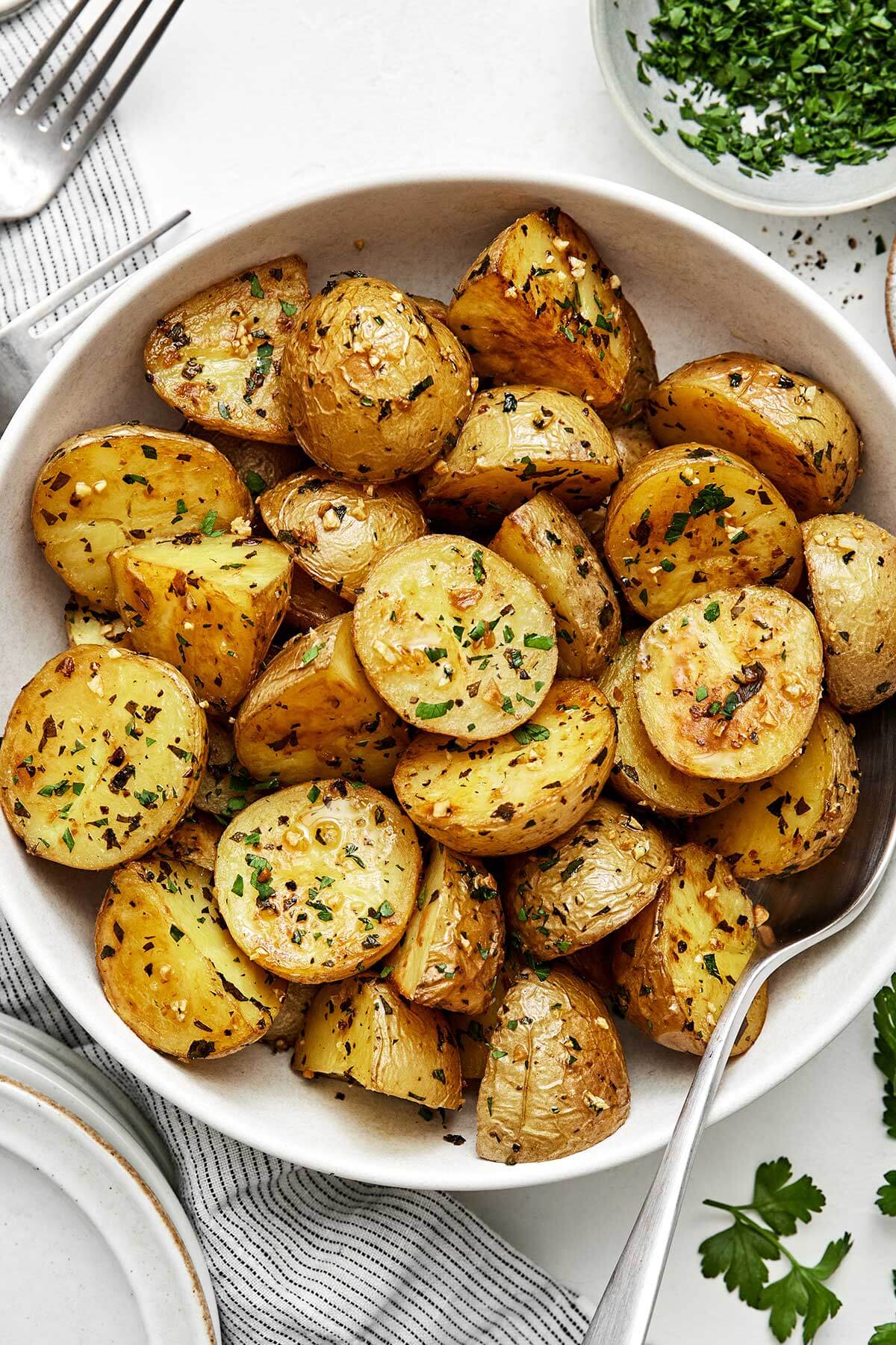 Garlic roasted potatoes in a bowl.