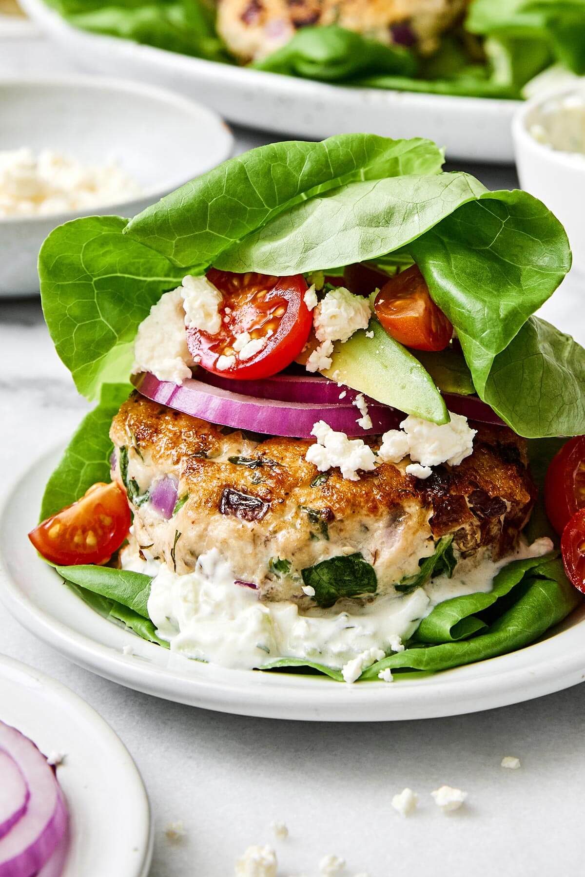 Greek chicken burger lettuce wrap.