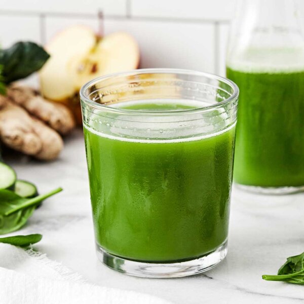 A glass of green juice.