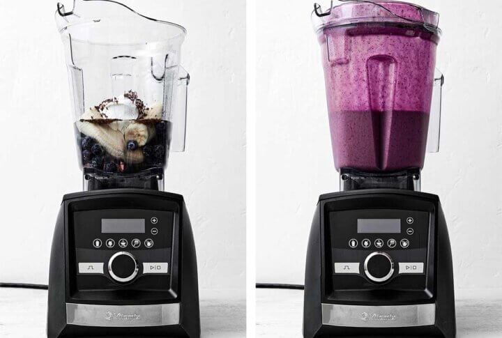 Blending a blueberry smoothie in a Vitamix.