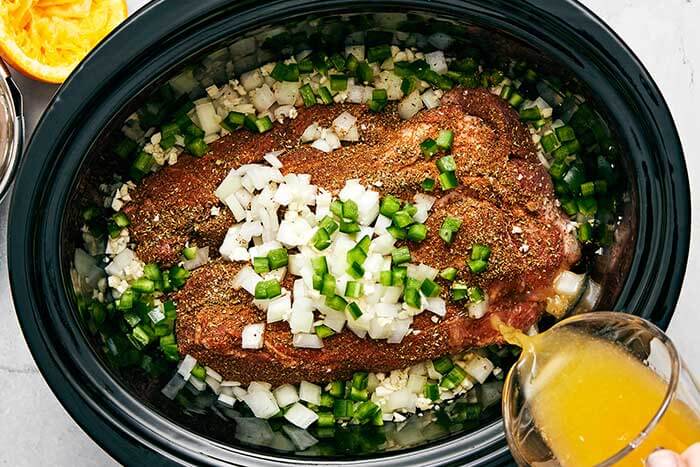 Cooking carnitas in a slow cooker.