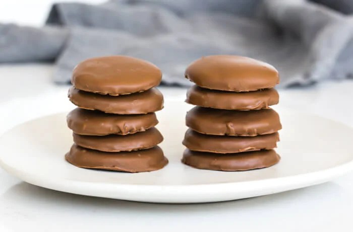 Piles of gluten-free thin mint cookies.