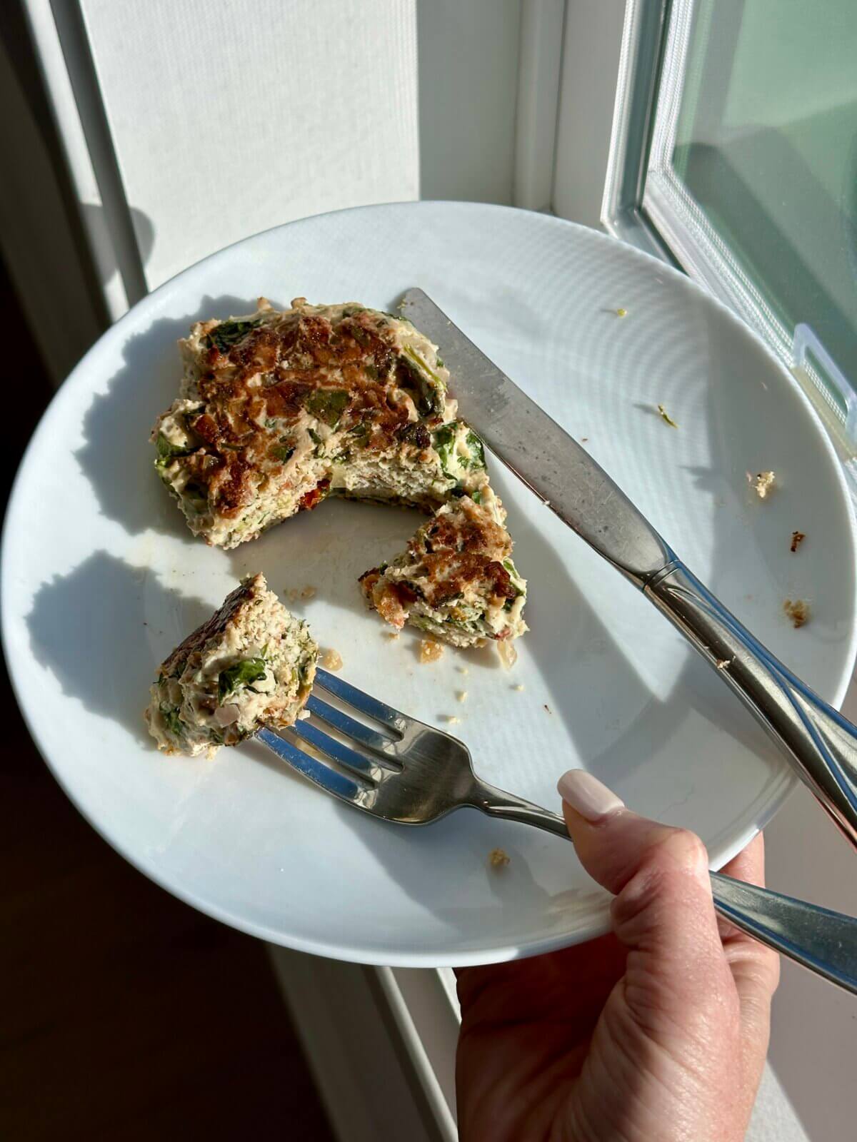 Greek chicken patty on a plate.