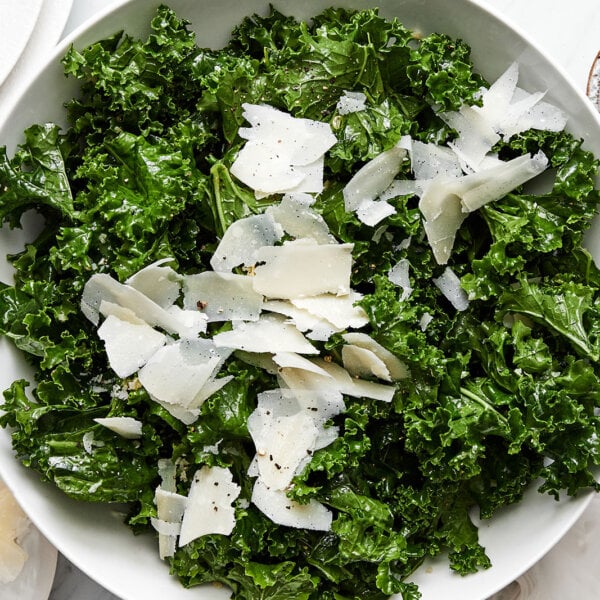 A bowl of kale salad.