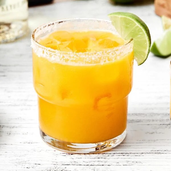 A glass of mango margarita.