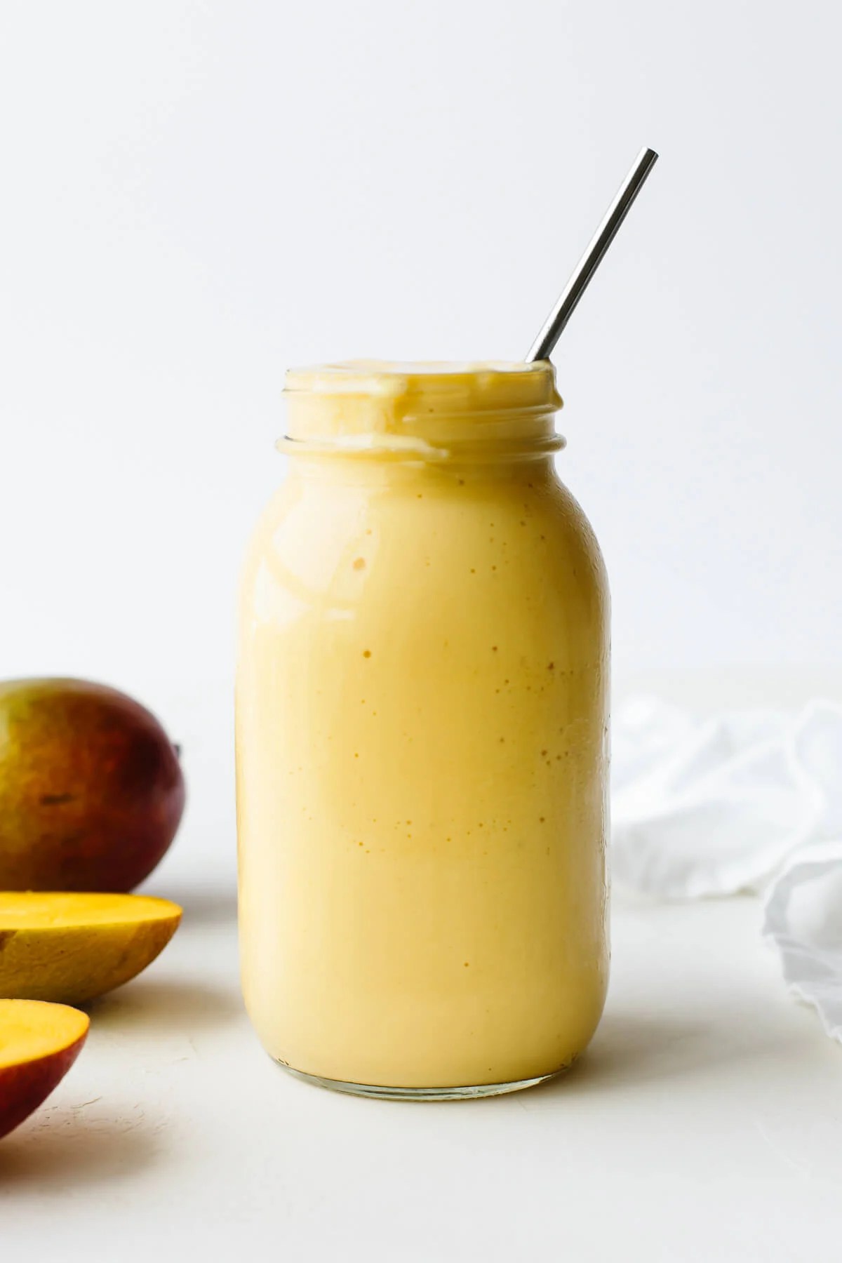 Mango smoothie in a mason jar