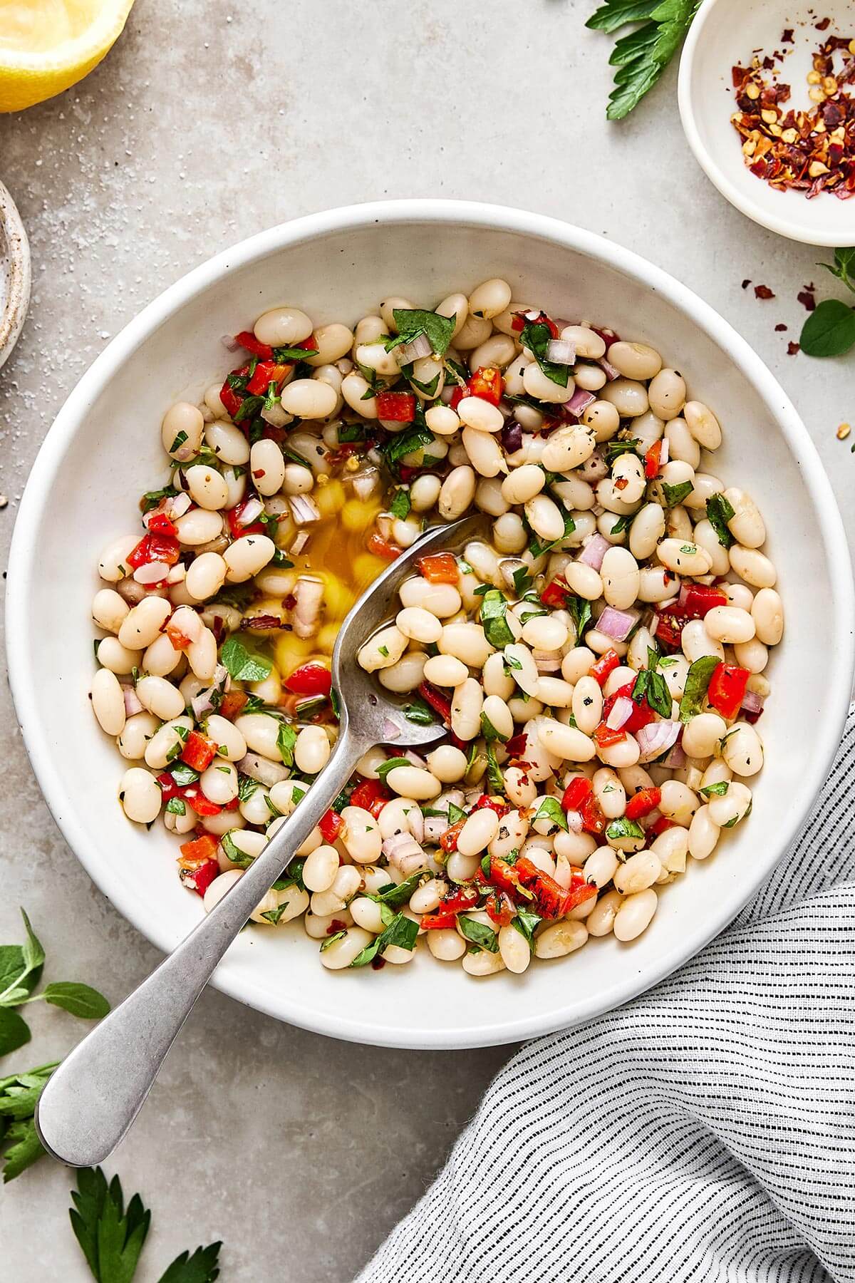 Marinated white beans in a bowl.