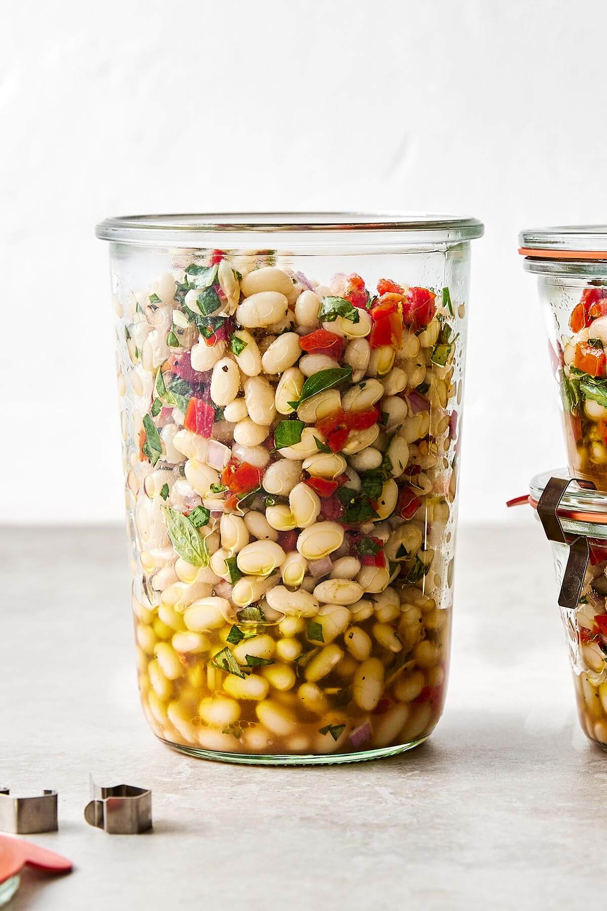 Marinated white beans in a jar.