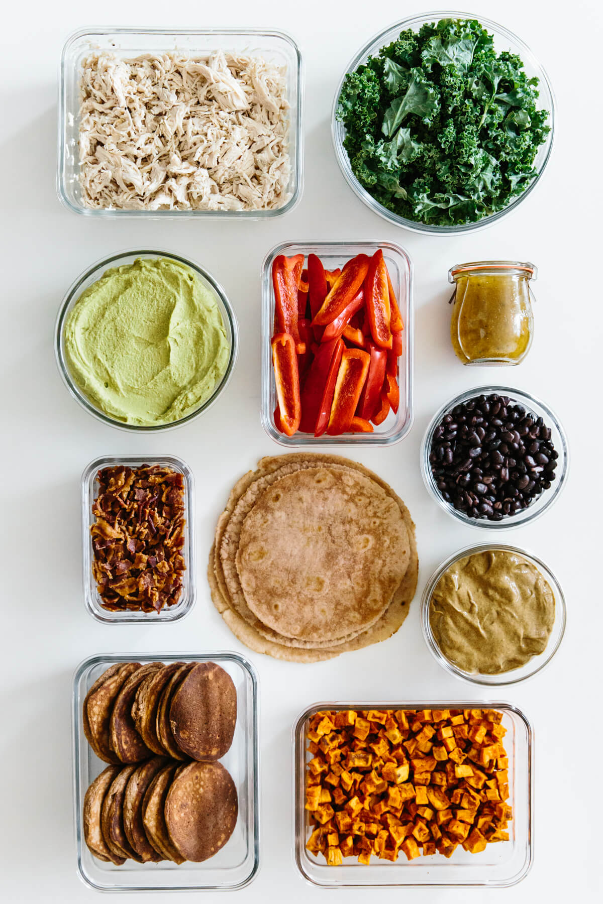 Meal prepped individual ingredients in containers.