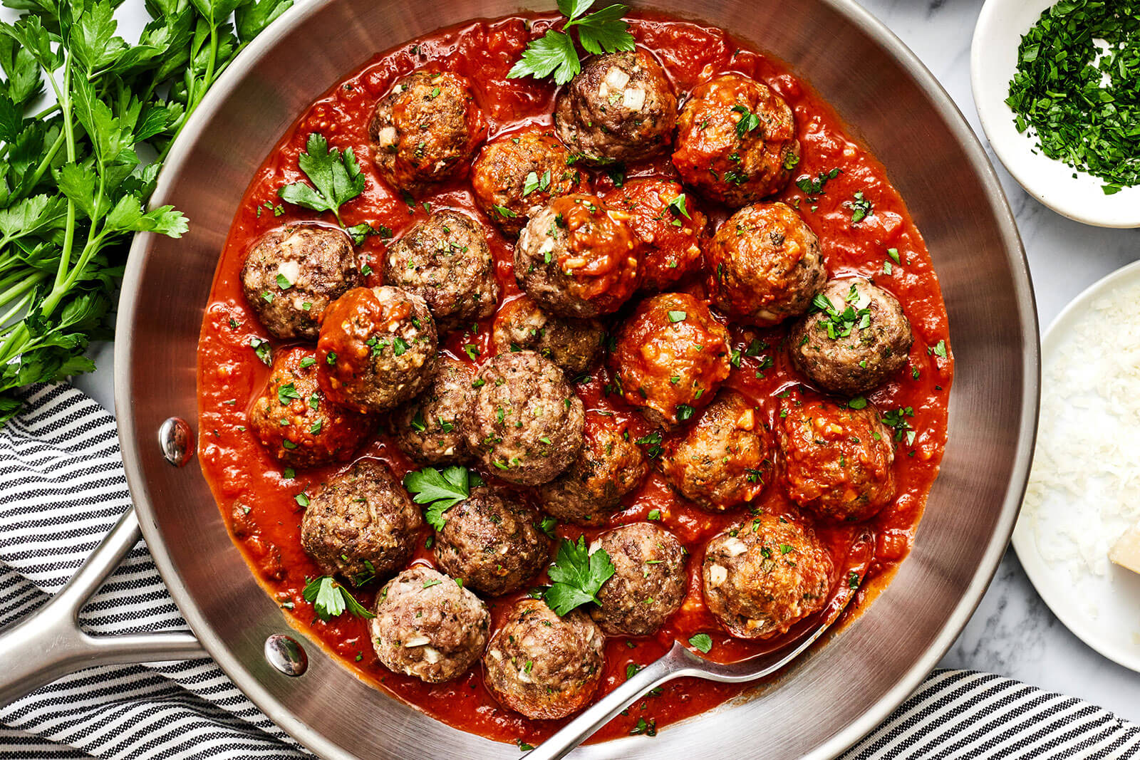 A pan of meatballs in marinara sauce