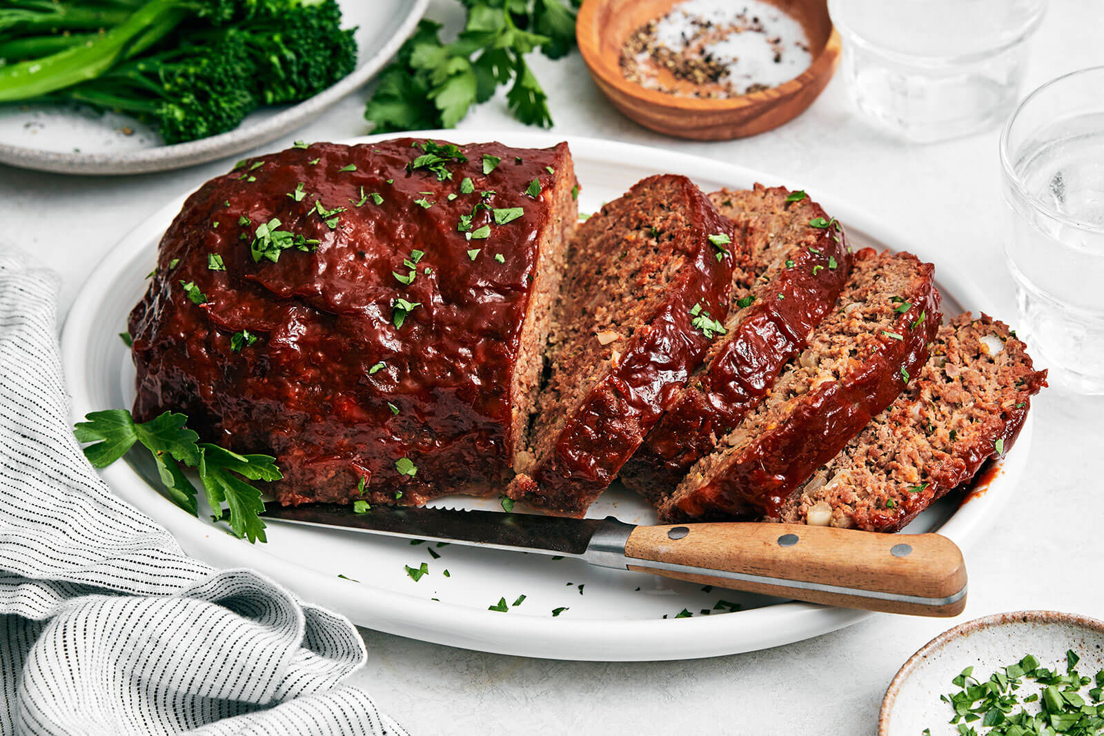 A platter of sliced meatloaf.