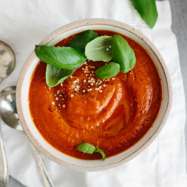 Roasted red pepper soup is a blend of red peppers, tomatoes, onion and garlic. It's a flavorful and healthy soup recipe!