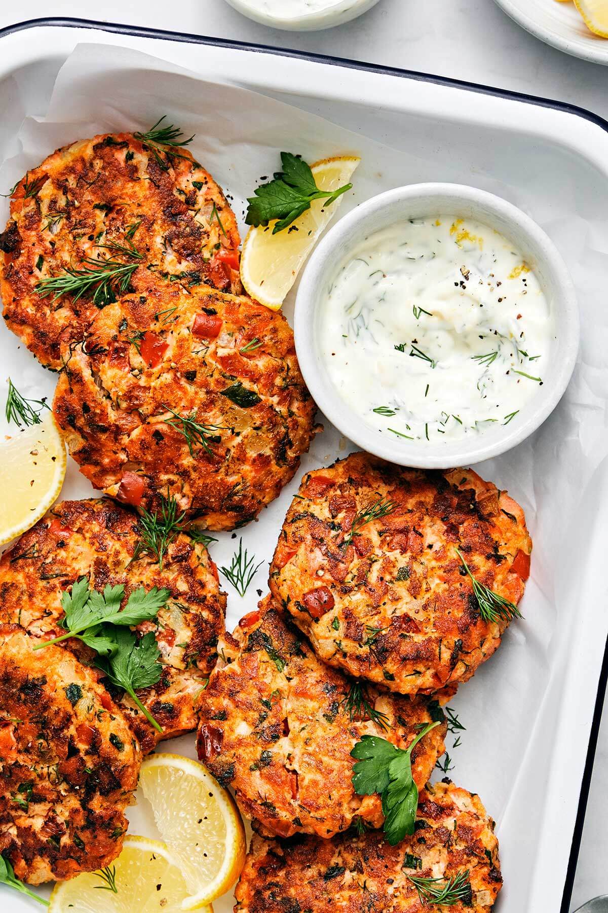 Salmon patties in a casserole dish.