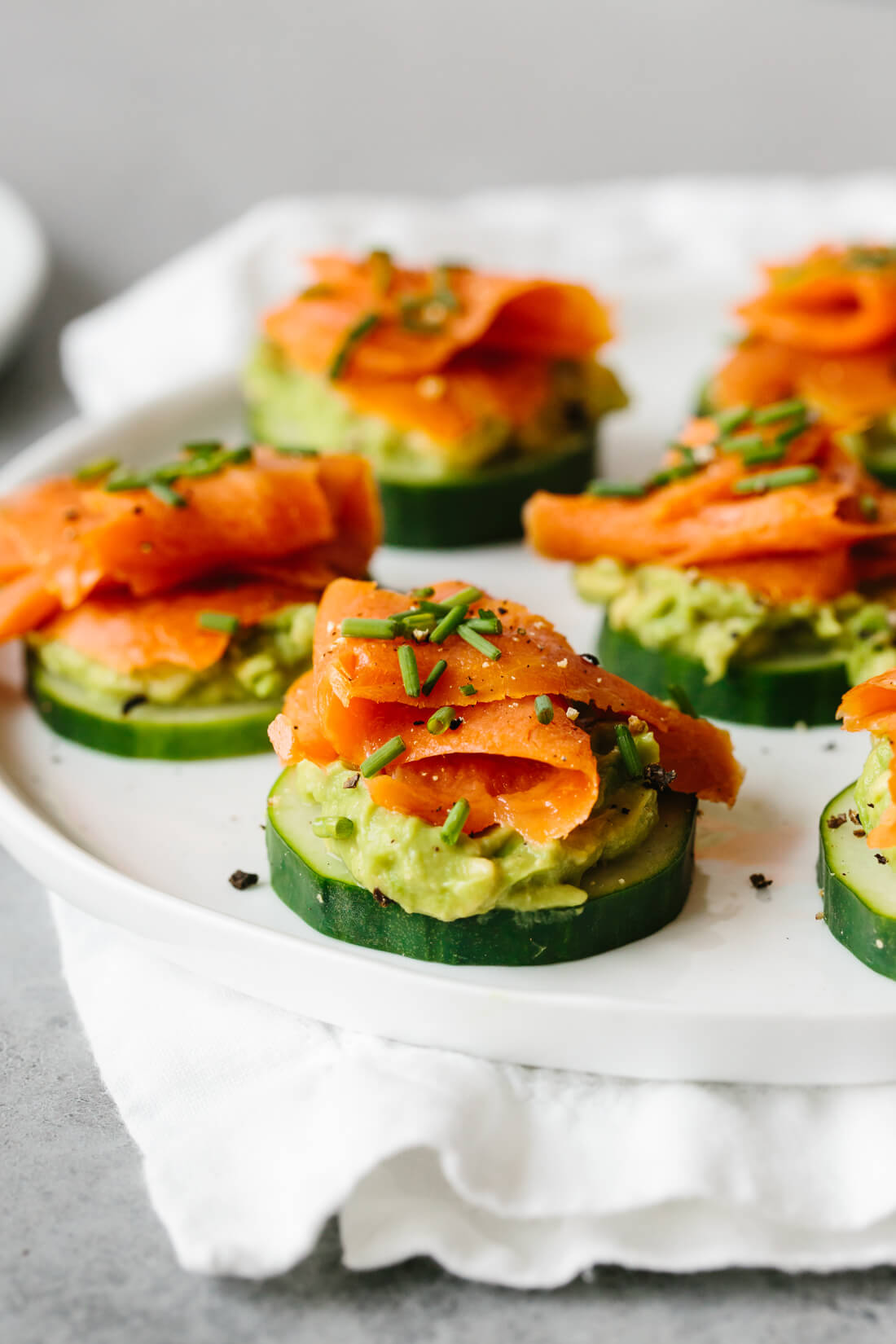 These smoked salmon, avocado and cucumber bites are the perfect healthy appetizer recipe.