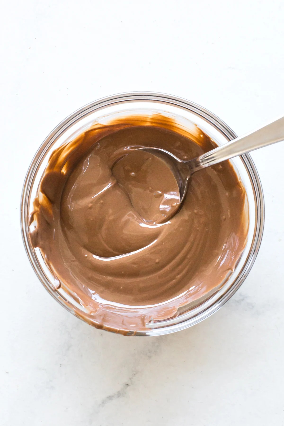 Chocolate glaze in a bowl.