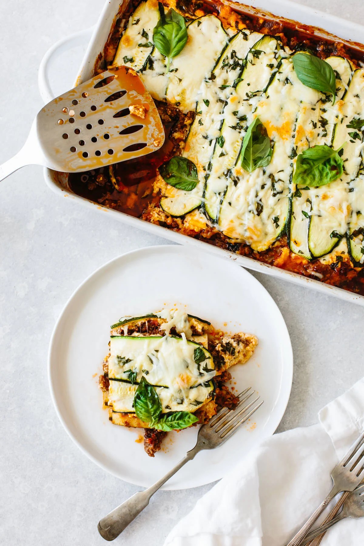 A slice of zucchini lasagna on a plate